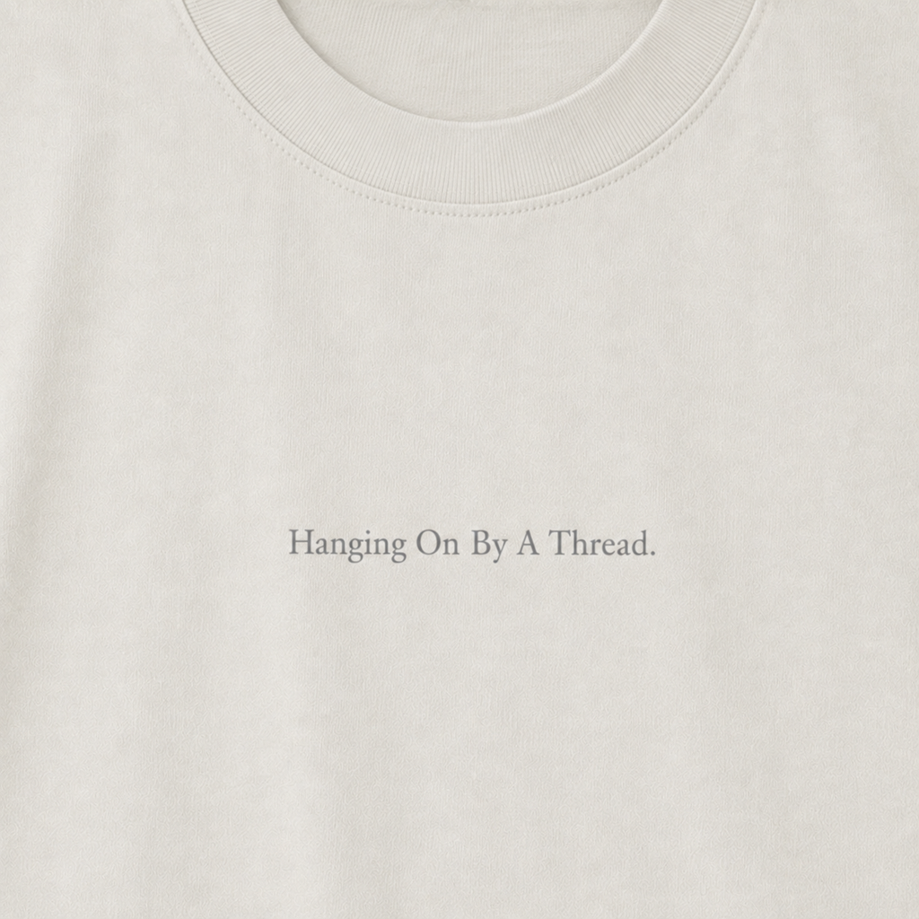 'Hanging On By A Thread.' - Minimalist Faded Tee